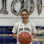 Paige Morton '20 pictured after scoring her 1000th point for oak knoll school