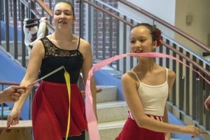Two dancers perform with ballet ribbon