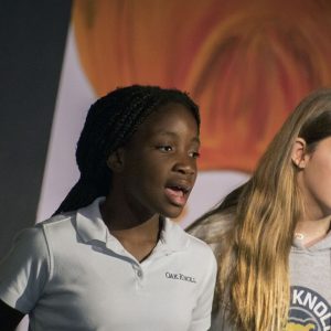 Students sing during special spring arts festival.